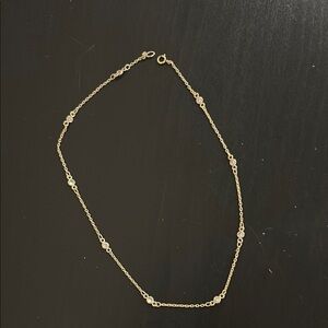Elegant Gold Necklace with Silver Accents